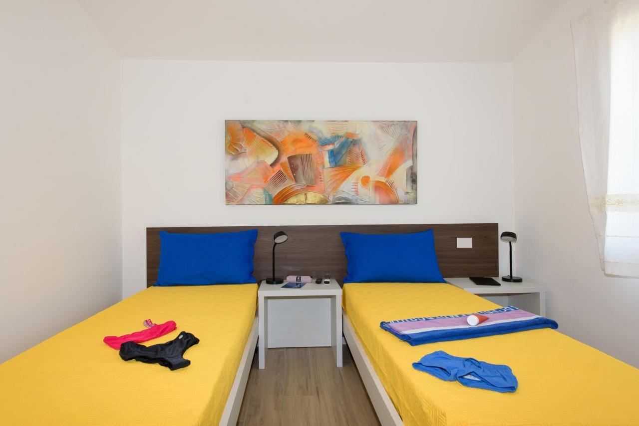 Апартаменты Loft Lungomare Vista Mare E Monti Арбатакс Экстерьер фото