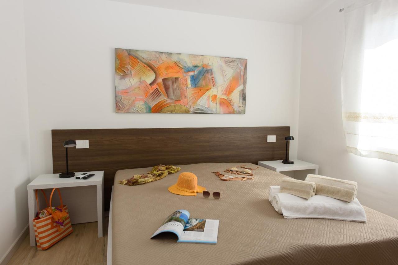 Апартаменты Loft Lungomare Vista Mare E Monti Арбатакс Экстерьер фото
